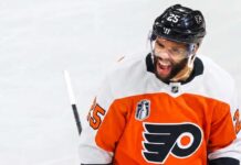Darnell Nurse Trade Rumors: Edmonton Oilers & Philadelphia Flyers Linked Conceptual photo of Edmonton Oilers defenseman Darnell Nurse wearing a white Philadelphia Flyers jersey amid NHL trade rumors.