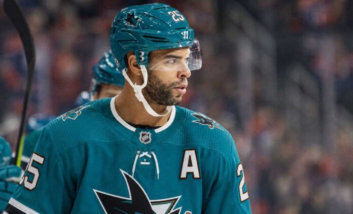 darnell-nurse-sharks-oilers-trade-rumors Darnell Nurse wearing a San Jose Sharks jersey and helmet amid Edmonton Oilers trade rumors linking him to San Jose