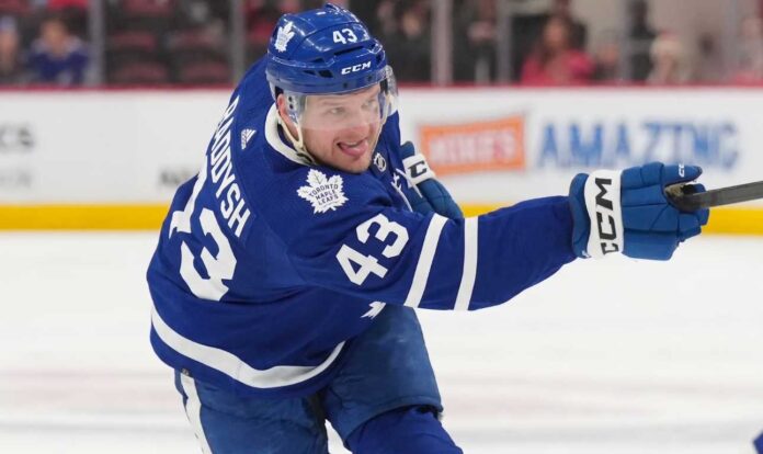 darren-raddysh-toronto-maple-leafs Toronto Maple Leafs defenseman Darren Raddysh windup up for a shot on goal.