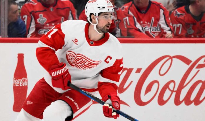 Dylan Larkin Detroit Red Wings captain skating past Coca-Cola boards as NHL trade rumors continue around Steve Yzerman’s offseason plans