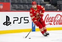 Why Ethan Belchetz is the Perfect First-Round Pick for the New York Islanders 6-foot-5 Windsor Spitfires power forward Ethan Belchetz, a target for the New York Islanders at the 2026 NHL Draft, controls the puck during a game.