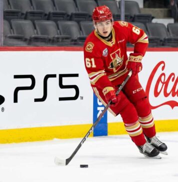 Why Ethan Belchetz is the Perfect First-Round Pick for the New York Islanders 6-foot-5 Windsor Spitfires power forward Ethan Belchetz, a target for the New York Islanders at the 2026 NHL Draft, controls the puck during a game.