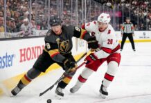 Carolina Hurricanes vs Vegas Golden Knights Game 3: How to Watch & Predictions Jack Eichel of the Vegas Golden Knights and Sebastian Aho of the Carolina Hurricanes battling for the puck along the boards during Game 3 of the 2026 Stanley Cup Final.