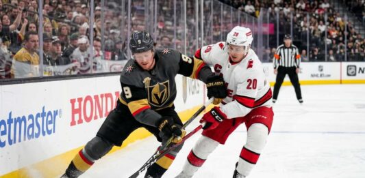 Carolina Hurricanes vs Vegas Golden Knights Game 3: How to Watch & Predictions Jack Eichel of the Vegas Golden Knights and Sebastian Aho of the Carolina Hurricanes battling for the puck along the boards during Game 3 of the 2026 Stanley Cup Final.