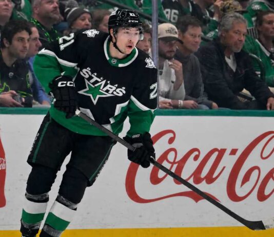 Jason Robertson of the Dallas Stars skating near the boards as NHL trade rumors, contract talks and July 1 offer sheet speculation continue.