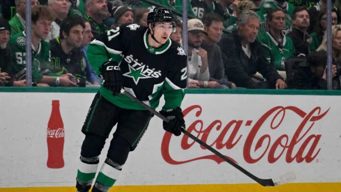 Jason Robertson of the Dallas Stars skating near the boards as NHL trade rumors, contract talks and July 1 offer sheet speculation continue.
