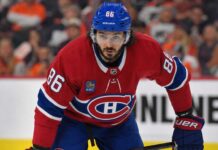 Kirill Marchenko wearing a Montreal Canadiens home jersey amid trade rumors linking the Columbus Blue Jackets winger to the Habs