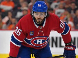Kirill Marchenko wearing a Montreal Canadiens home jersey amid trade rumors linking the Columbus Blue Jackets winger to the Habs