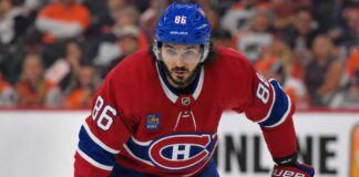 Kirill Marchenko wearing a Montreal Canadiens home jersey amid trade rumors linking the Columbus Blue Jackets winger to the Habs
