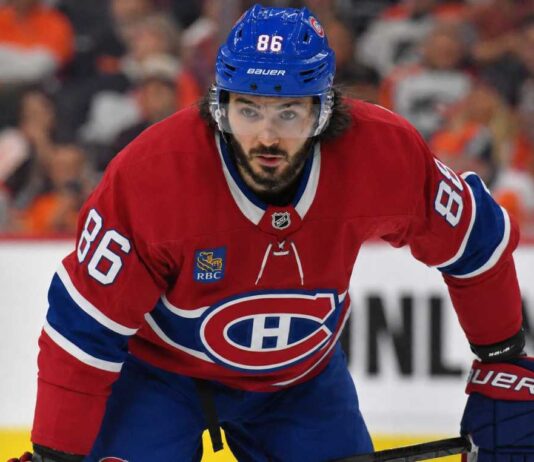 Kirill Marchenko wearing a Montreal Canadiens home jersey amid trade rumors linking the Columbus Blue Jackets winger to the Habs