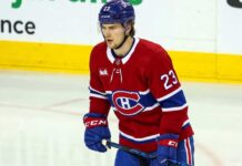 Matthew Knies Trade Rumors: Why the Canadiens & Maple Leafs Deal Failed An imagined photo of hockey player Matthew Knies in a Montreal Canadiens home jersey on the ice.
