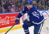 Toronto Maple Leafs Trade Rumors: Will Matthew Knies Be Moved? Matthew Knies #23 of the Toronto Maple Leafs skating during an NHL game, surrounded by NHL trade rumors.