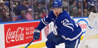 Toronto Maple Leafs Trade Rumors: Will Matthew Knies Be Moved? Matthew Knies #23 of the Toronto Maple Leafs skating during an NHL game, surrounded by NHL trade rumors.
