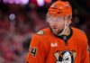 Close-up photo of Toronto Maple Leafs defenseman Morgan Rielly (#44) visualized in an Anaheim Ducks uniform looking thoughtfully during an NHL hockey game.