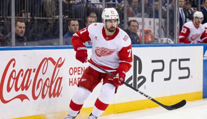 nhl-news-rumors-scores-june-9-2026 Detroit Red Wings captain Dylan Larkin skating in an away jersey during an NHL game, highlighting the latest NHL trade rumors and recent NHL news.
