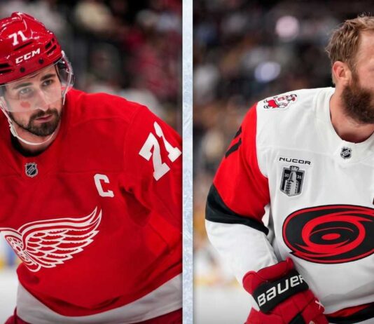 NHL News & Rumors Today: Carolina Hurricanes Take 3-2 Series Lead, latest Larkin rumors A split-screen composite photograph for an NHL news blog. The left panel features Detroit Red Wings captain Dylan Larkin (#71) in a red home jersey, holding his stick with an intense gaze, highlighting current NHL trade rumors. The right panel shows Carolina Hurricanes captain Jordan Staal in a white away jersey, with the Stanley Cup patch and 'C', looking over his shoulder during a game, representing his team's push in the Stanley Cup Final.