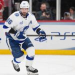 Nikita Kucherov point projections 2026-27 for the Tampa Bay Lightning fantasy hockey season with PS5 rink board ad