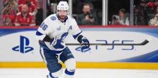 Nikita Kucherov point projections 2026-27 for the Tampa Bay Lightning fantasy hockey season with PS5 rink board ad