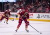 Boston College freshman and 2026 NHL Draft prospect Oscar Hemming #9 puck handling during an NCAA hockey game.