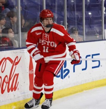 St. Louis Blues 2026 NHL Draft: Why Tynan Lawrence at #11 Makes Sense Tynan Lawrence, Boston University center and St. Louis Blues 2026 draft prospect, in action on the ice wearing jersey #11.