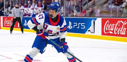 Wyatt Cullen: Why the Nashville Predators Should Draft Him #10 USNTDP forward Wyatt Cullen, a top 2026 NHL Draft prospect for the Nashville Predators, controls the puck during a game.