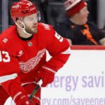 Will the Detroit Red Wings Trade Alex DeBrincat or Re-Sign Their Top Goal Scorer? Alex DeBrincat skating for the Detroit Red Wings as contract extension and NHL trade rumors surround his future in Detroit