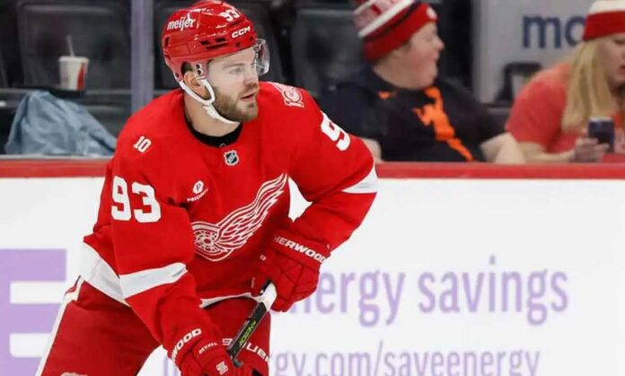 alex-debrincat-detroit-red-wings-contract-trade-rumors Alex DeBrincat skating for the Detroit Red Wings as contract extension and NHL trade rumors surround his future in Detroit