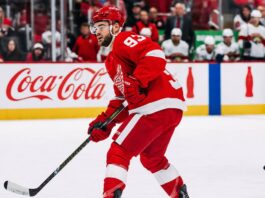 Detroit Red Wings Alex DeBrincat Trade Rumors: Will Detroit Trade Him? Alex DeBrincat skating for the Detroit Red Wings as trade rumors raise questions about his future in Detroit