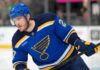 St. Louis Blues Emerge as Serious Alexander Nikishin Trade Candidate Alexander Nikishin pictured in a St. Louis Blues home jersey amid trade rumors linking the Carolina Hurricanes defenseman to St. Louis.