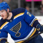 St. Louis Blues Emerge as Serious Alexander Nikishin Trade Candidate Alexander Nikishin pictured in a St. Louis Blues home jersey amid trade rumors linking the Carolina Hurricanes defenseman to St. Louis.