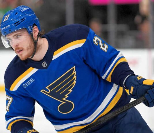 St. Louis Blues Emerge as Serious Alexander Nikishin Trade Candidate Alexander Nikishin pictured in a St. Louis Blues home jersey amid trade rumors linking the Carolina Hurricanes defenseman to St. Louis.