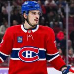 Montreal Canadiens defenceman in a red home jersey during an NHL game as Arber Xhekaj trade rumors continue