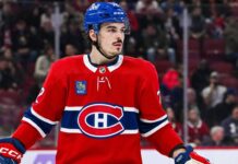 Montreal Canadiens Trade Rumors: Teams Keep Calling About Arber Xhekaj Montreal Canadiens defenceman in a red home jersey during an NHL game as Arber Xhekaj trade rumors continue