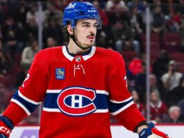 Montreal Canadiens Trade Rumors: Teams Keep Calling About Arber Xhekaj Montreal Canadiens defenceman in a red home jersey during an NHL game as Arber Xhekaj trade rumors continue