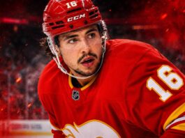 Morgan Frost in a Calgary Flames jersey amid NHL trade rumors as Calgary listens to offers for the centre