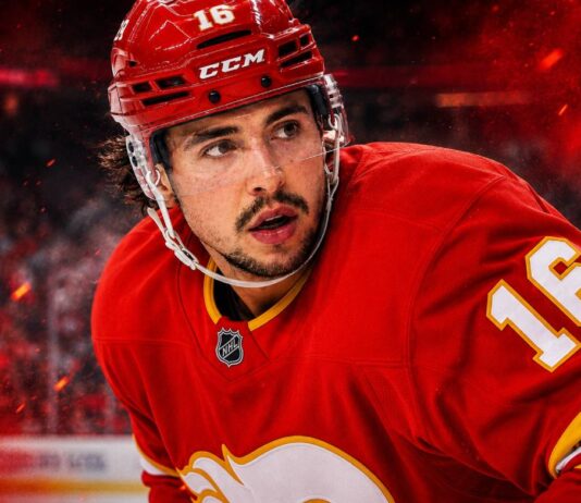 Morgan Frost in a Calgary Flames jersey amid NHL trade rumors as Calgary listens to offers for the centre