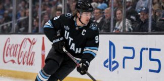 Clayton Keller skating in a Utah Mammoth home jersey during a 2026-27 fantasy hockey projection predicting 30 goals, 65 assists and 95 points.