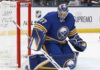 Connor Hellebuyck Open to Buffalo Sabres Trade as Winnipeg Jets Talks Continue Connor Hellebuyck wearing a Buffalo Sabres home uniform and matching goalie equipment amid trade rumors involving the Winnipeg Jets.