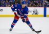Connor Zary Linked to New York Rangers as Calgary Flames Explore Trade Market Connor Zary wearing a New York Rangers home jersey amid NHL trade rumors linking the Calgary Flames forward to New York