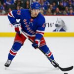 Connor Zary Linked to New York Rangers as Calgary Flames Explore Trade Market Connor Zary wearing a New York Rangers home jersey amid NHL trade rumors linking the Calgary Flames forward to New York