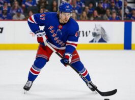 Connor Zary Linked to New York Rangers as Calgary Flames Explore Trade Market Connor Zary wearing a New York Rangers home jersey amid NHL trade rumors linking the Calgary Flames forward to New York
