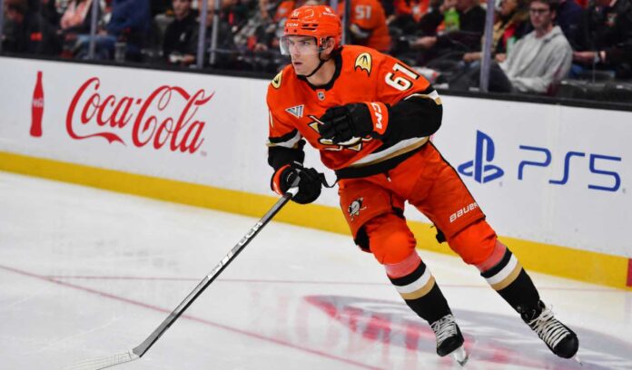 cutter-gauthier-anaheim-ducks-contract-rumors Cutter Gauthier skating for the Anaheim Ducks beside Coca-Cola and PS5 rink-board ads amid NHL contract rumors