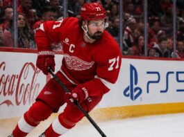 Will Dylan Larkin Stay With the Detroit Red Wings After Steve Yzerman’s Exit? Detroit Red Wings captain Dylan Larkin skating along the boards as trade speculation continues following Steve Yzerman’s departure.