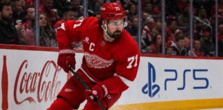 Will Dylan Larkin Stay With the Detroit Red Wings After Steve Yzerman’s Exit? Detroit Red Wings captain Dylan Larkin skating along the boards as trade speculation continues following Steve Yzerman’s departure.
