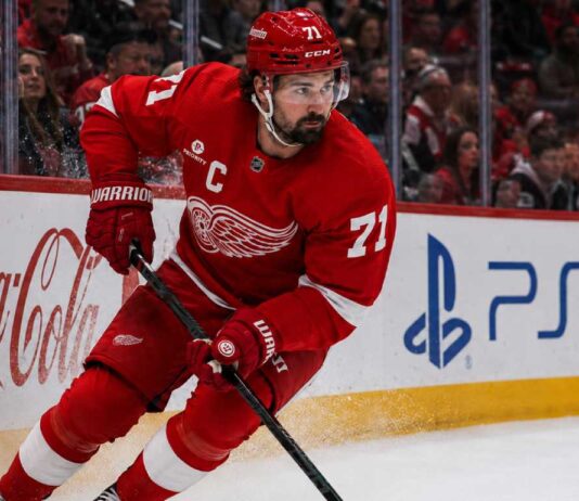 Will Dylan Larkin Stay With the Detroit Red Wings After Steve Yzerman’s Exit? Detroit Red Wings captain Dylan Larkin skating along the boards as trade speculation continues following Steve Yzerman’s departure.