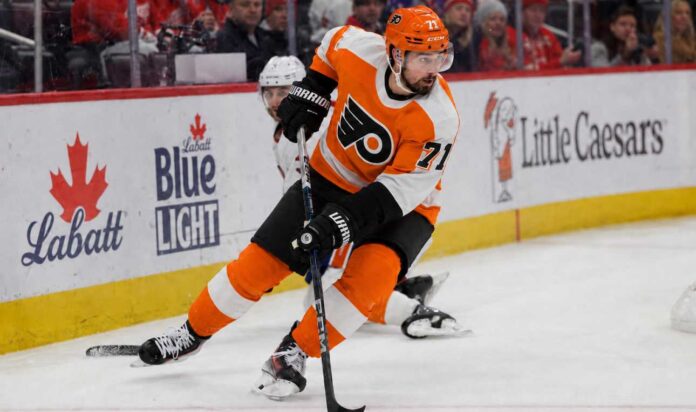 dylan-larkin-flyers-trade-rumors-red-wings Dylan Larkin wearing a Philadelphia Flyers home jersey amid trade speculation involving the Detroit Red Wings