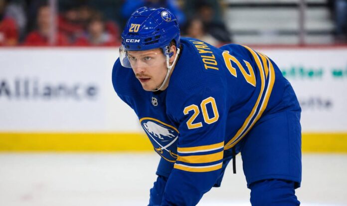 Eeli Tolvanen wearing a Buffalo Sabres home jersey amid NHL free-agent rumors linking him to Buffalo