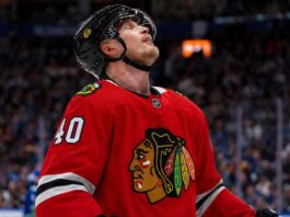 Elias Pettersson Trade Rumor: Why the Vancouver Canucks Center Fits the Chicago Blackhawks Elias Pettersson wearing a Chicago Blackhawks home jersey and helmet amid NHL trade rumors involving the Vancouver Canucks
