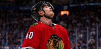 Elias Pettersson Trade Rumor: Why the Vancouver Canucks Center Fits the Chicago Blackhawks Elias Pettersson wearing a Chicago Blackhawks home jersey and helmet amid NHL trade rumors involving the Vancouver Canucks