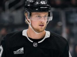 Los Angles Kings Call Vancouver Canucks About Elias Pettersson Trade Elias Pettersson wearing a Los Angeles Kings home jersey and helmet amid trade speculation involving the Vancouver Canucks
